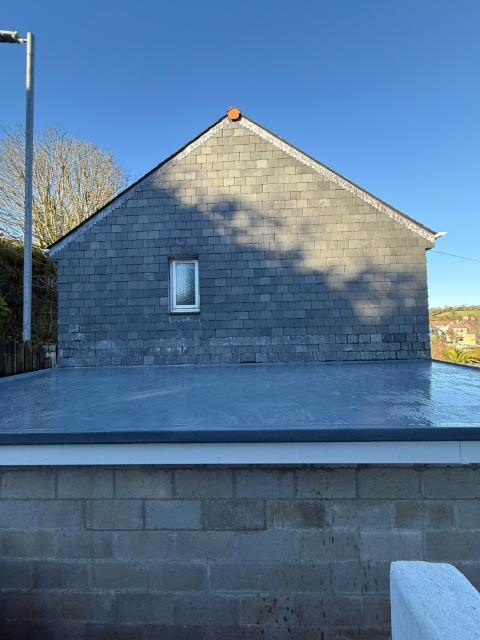 A new GRP fibreglass flat roof on a single-storey extension